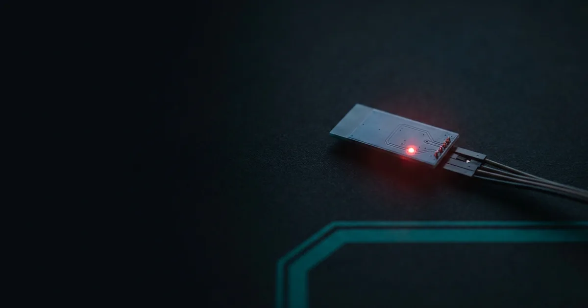An HC-05 Bluetooth module wired to an Arduino Uno, its status LED blinking